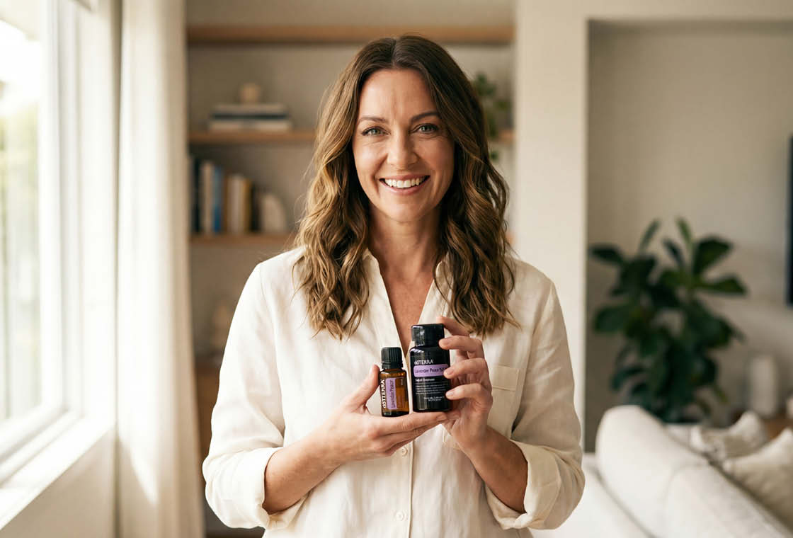 A woman holding the dōTERRA Sleep Well Pack products