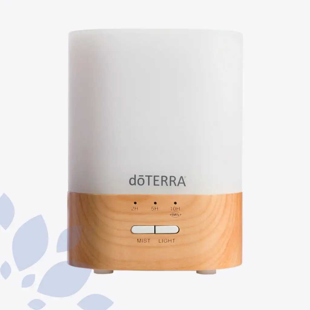 dōTERRA Lumo Diffuser with a modern wood grain base and soft white top, designed for aromatherapy and essential oil diffusion.