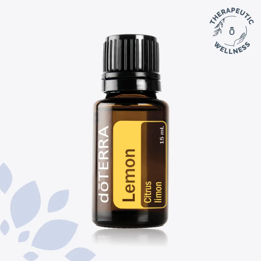 dōTERRA Lemon Oil in a 15mL amber bottle, showcasing its purity and bright citrus benefits for wellness and home use.