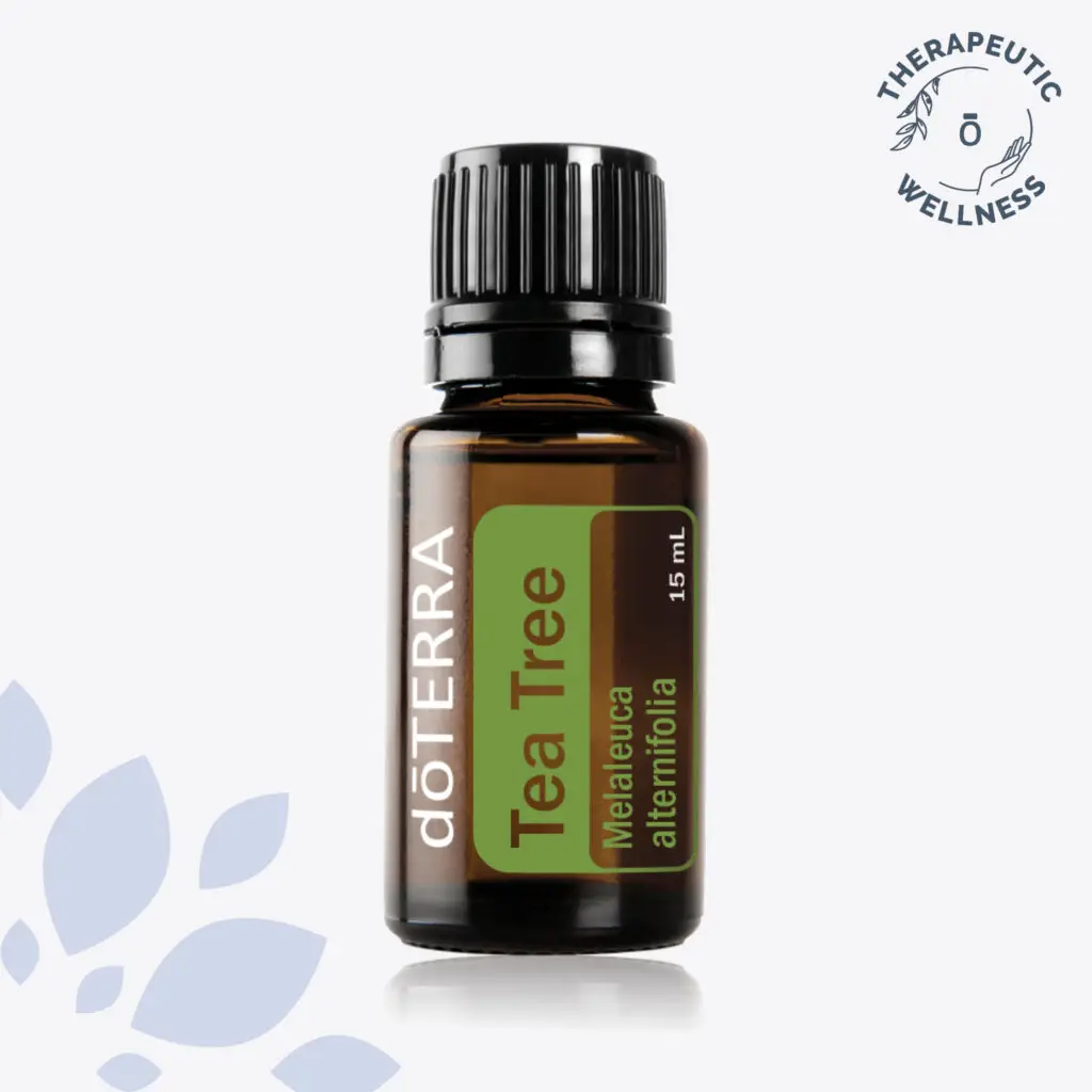 Bottle of dōTERRA Tea Tree Oil (Melaleuca alternifolia) 15 mL, known for its purifying and skin-soothing properties, with a therapeutic wellness seal in the corner.
