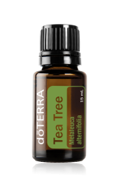 15 mL bottle of dōTERRA Tea Tree Oil (Melaleuca alternifolia) with a green label and black cap.